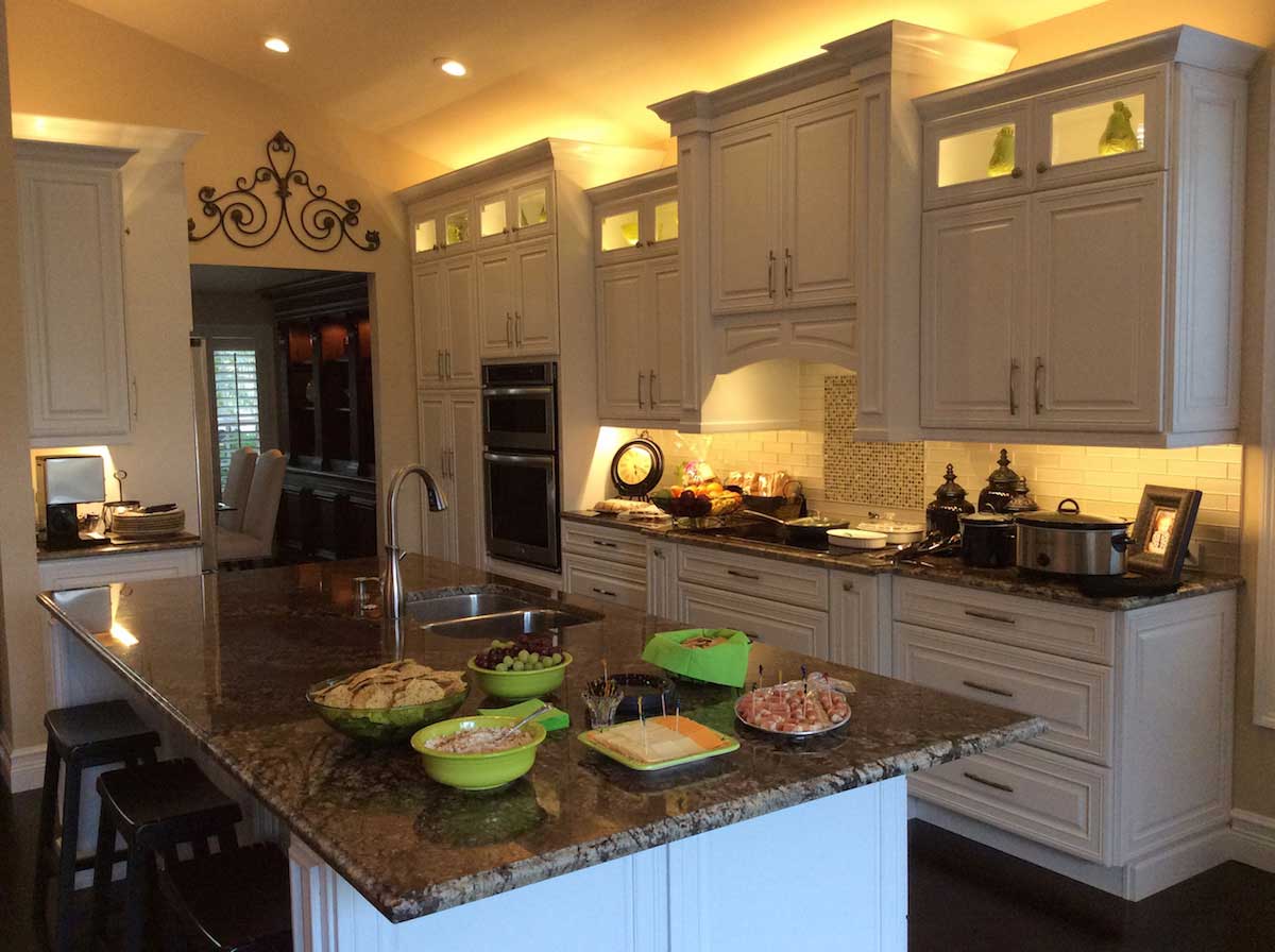 add light in kitchen soffets above cabinet